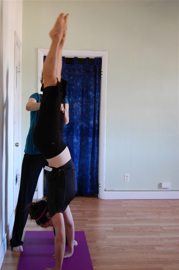 This picture illustrates again the dropping forward of the ribcage and the slight banana in the back!  The body goes into this posture as a protective mechanism in the case of falling. This holds true for all postures.  The lower back moves into a higher arch and acts as the main shock absorber for the entire posture simply because it is the most flexible part of the body.  So, we want to first neutralize the low back, and we do that by pulling the navel in and drawing the tailbone forward.