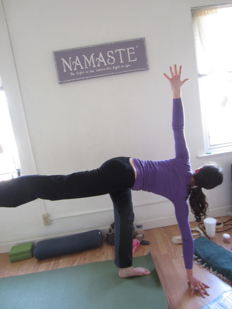 For fun, with all of this great alignment and support, simply bend the front knee, and extend the back leg in the air! You have yourself here a strong internal rotation on the hips and a very lovely length in the spine.  This pose is beautiful. It is called Pavritta Ardha Chandrasana.