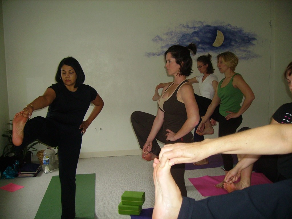 When students are not yet ready for this posture, introduce the option to keep the front knee bent and holding onto the big toe. In this photo, one can see how many different variations there truly are!  Keep lighting up out of the chest and feel the strong external rotation in the upper back.  It may look as if there is little effort, but really there is so much going on, which is great to help us with mindfulness energy.