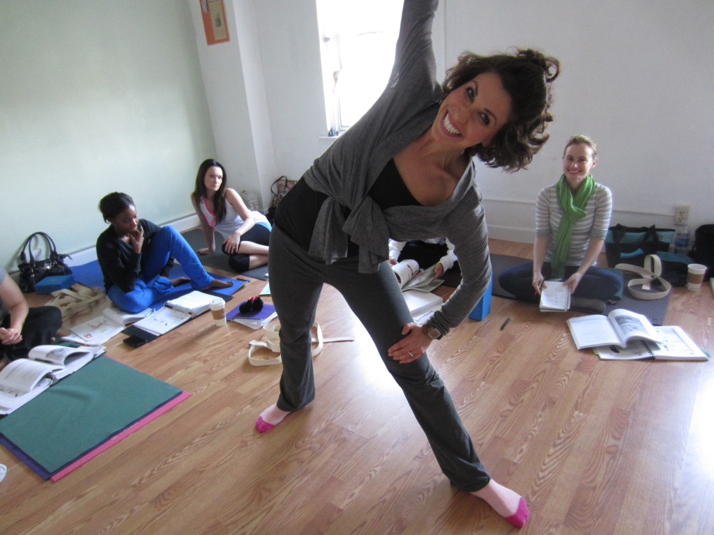 From the correct alignment of the feet, front heel with inner back arch, and torso bending from the front hip and front hand on the top front thigh, not lower foot, a vast rage of possibility can occur.  The result here is a a cascade of opening in the heart. There is so much expansion possible because her Triangle is well supported and you can see from her face, she is having FUN! See out places in the body that are collapsed and find greater support from within. Work energy into the front big toe and back little toe. 